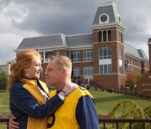 Shalee and Scott in front of the WVU Alumni Center